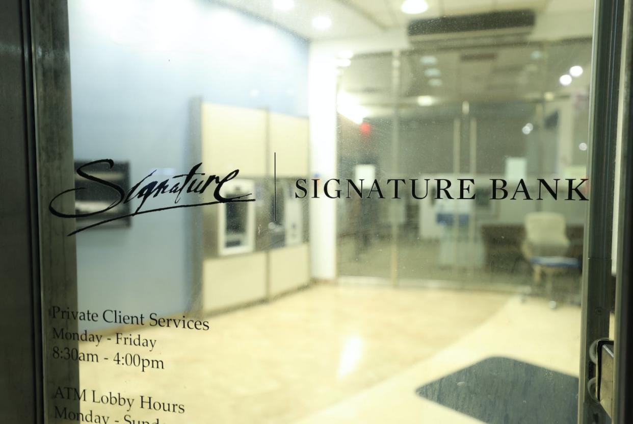 Outside Signature Bank headquarters in New York City. Regulators closed the bank on March 12, 2023. <a href="https://www.gettyimages.com/detail/news-photo/the-signature-bank-headquarters-at-565-fifth-avenue-in-new-news-photo/1248106828?adppopup=true" rel="nofollow noopener" target="_blank" data-ylk="slk:Lokman Vural Elibol/Anadolu Agency via Getty Images;elm:context_link;itc:0;sec:content-canvas" class="link ">Lokman Vural Elibol/Anadolu Agency via Getty Images</a>