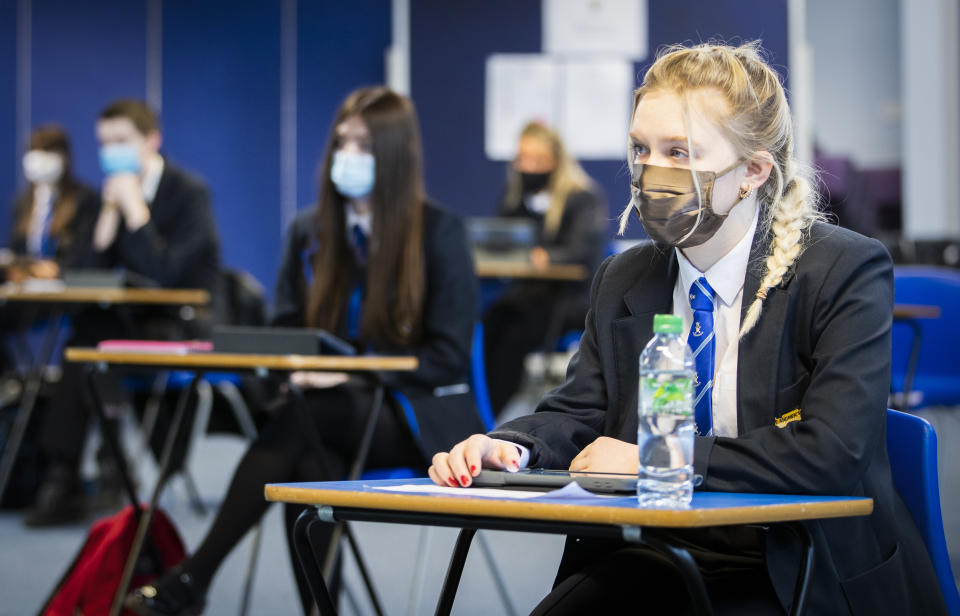 <p>S5 and S6 students during an English Literature class at St Andrew's RC Secondary School in Glasgow as more pupils are returning to school in Scotland in the latest phase of lockdown easing. Picture date: Monday March 15, 2021.</p>
