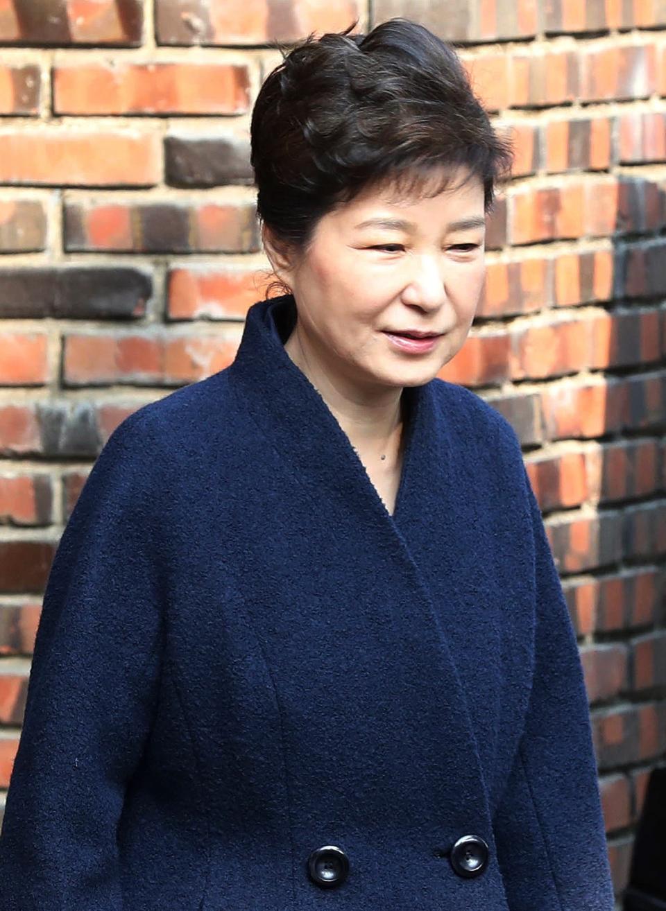 South Korean ousted President Park Geun-hye leaves from her private home to prosecutors office in Seoul, South Korea, Tuesday, March 21, 2017. (Kim Hyun-tae/Yonhap via AP)