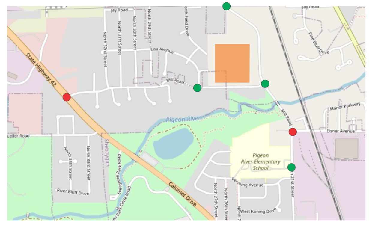 A map of the proposed location of Urban Middle School (in orange) shows the intersections studied by TADI in the traffic analysis. The red dots indicate intersections with suggested improvements.