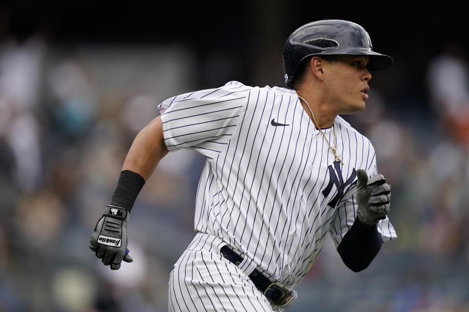 New York Yankees' Gio Urshela runs the bases after hitting a go-ahead solo home run off Oakland Athletics relief pitcher Jesus Luzardo in the eighth inning of a baseball game, Saturday, June 19, 2021, in New York. (AP Photo/John Minchillo)