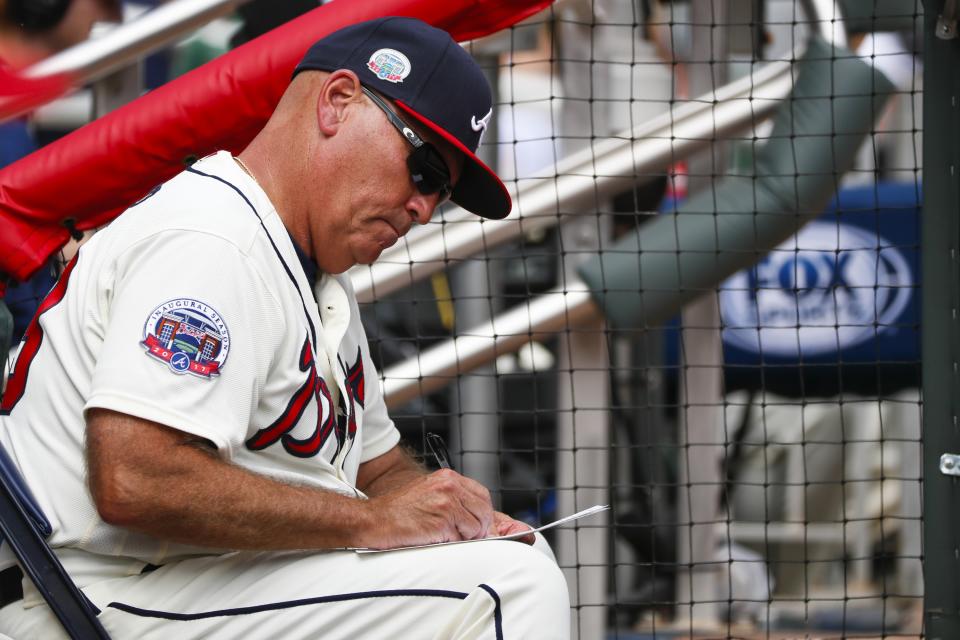 Brian Snitker could be out with the Braves (Photo by Todd Kirkland/Getty Images)