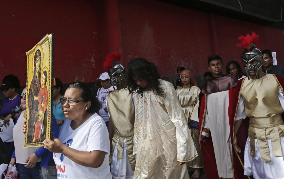 Jose Fuentes, center, portrays Jesus Christ during a Good Friday procession in Panama City on April 19, 2019. (Arnulfo Franco / ASSOCIATED PRESS)