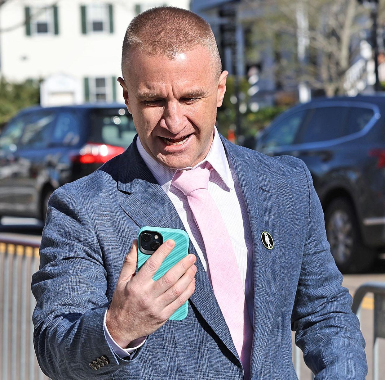 Aidan Kearney outside Norfolk Superior Court in Dedham on April 16.