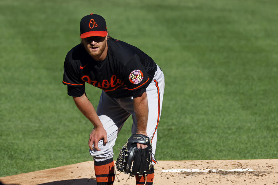 Baltimore Orioles pitcher Alex Cobb reacts after giving up a two-run home run to New York Yankees' Brett Gardner during the first inning of the first baseball game of a doubleheader, Friday, Sept. 11, 2020, in New York. (AP Photo/Adam Hunger)