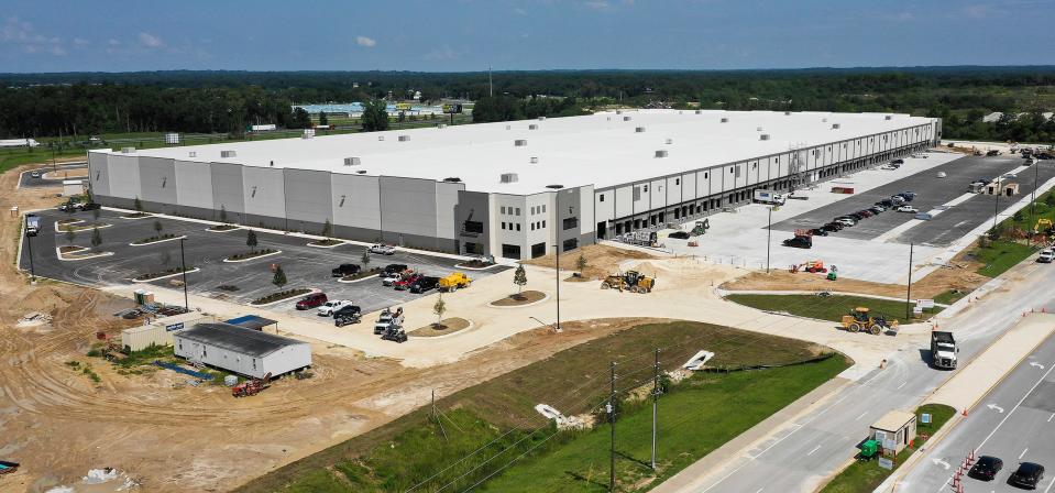 Construction workers were busy at the site of the new Amazon distribution facility on June 10, 2020.