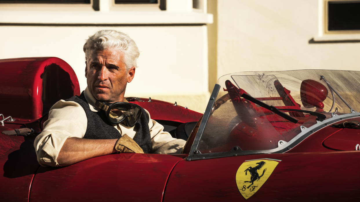  Patrick Dempsey sits in a Ferrari on the set of Ferrari: The Movie. 