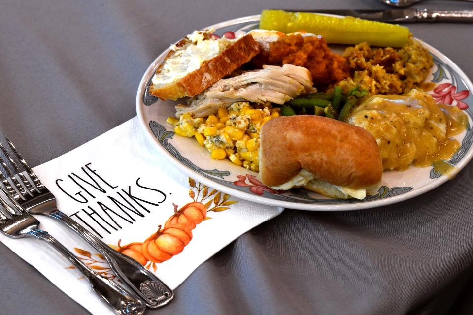 A plate of turkey, dressing and other traditional seasonal sides rests on a table during Hendrick Home for Children’s Family Thanksgiving Nov. 12.