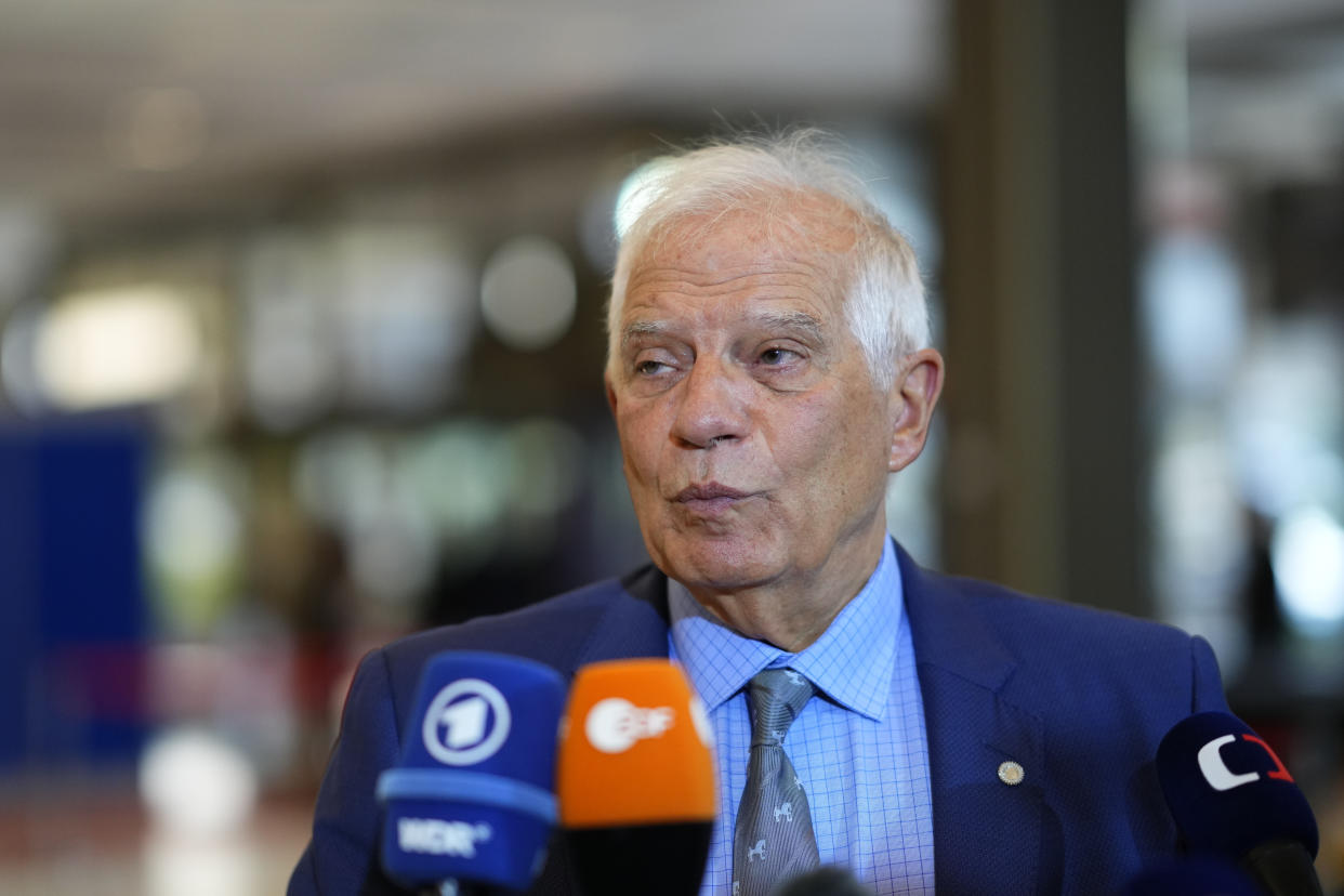 European Union foreign policy chief Josep Borrell speaks with the media as he arrives for a meeting of EU foreign ministers at the Prague Congress Center in Prague, Czech Republic, Wednesday, Aug. 31, 2022. (AP Photo/Petr David Josek)