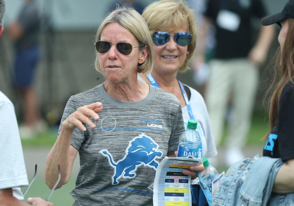 Detroit Lions owner Sheila Hamp talks with players' families after a training camp practice at team headquarters in Allen Park on Friday, July 28, 2023.