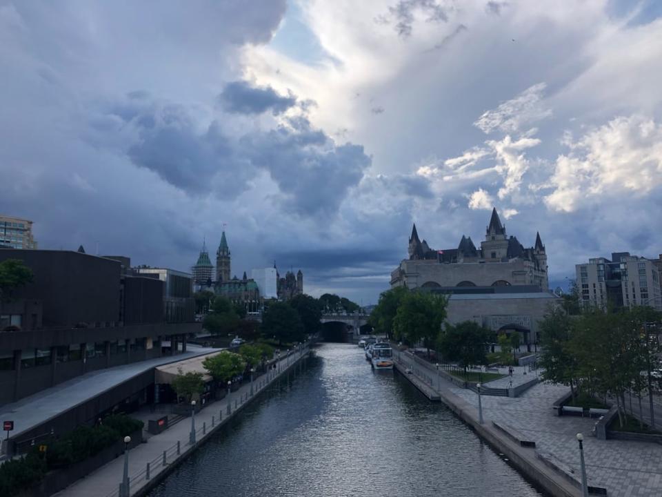 Clouds loom large over the Rideau Canal and the Château Laurier hotel in Ottawa on Aug. 9, 2019. (Olivia Chandler/CBC - image credit)