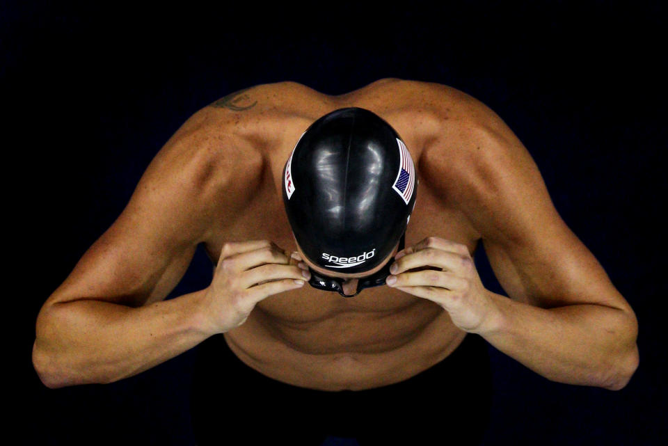 Ryan Lochte of the United States adjusts his goggles before the Men's 200m Backstroke Final during Day Fourteen of the 14th FINA World Championships at the Oriental Sports Center on July 29, 2011 in Shanghai, China. (Photo by Feng Li/Getty Images)