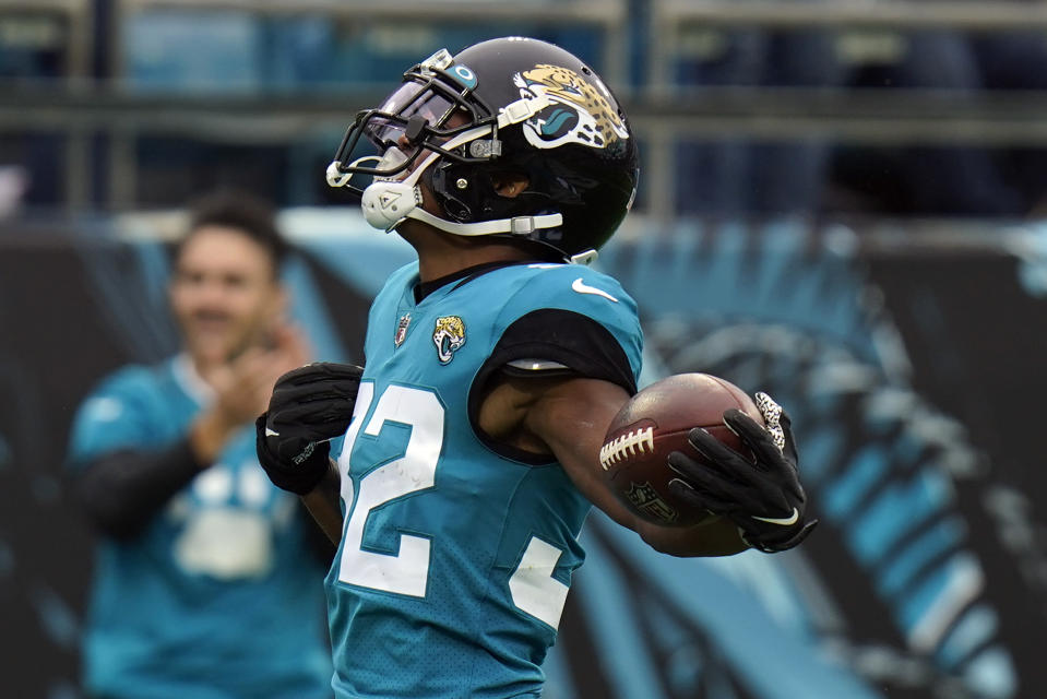 Jacksonville Jaguars cornerback Tyson Campbell celebrates after intercepting an Atlanta Falcons pass during the first half of an NFL football game, Sunday, Nov. 28, 2021, in Jacksonville, Fla. (AP Photo/Chris O'Meara)