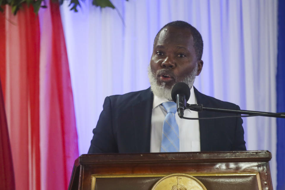 Transitional council member Frisnel Joseph speaks during a ceremony to name its president and a prime minister in Port-au-Prince, Haiti, Tuesday, April 30, 2024. The transitional council will act as the country’s presidency until it can arrange presidential elections sometime before it disbands, which must be by February 2026. (AP Photo/Odelyn Joseph)