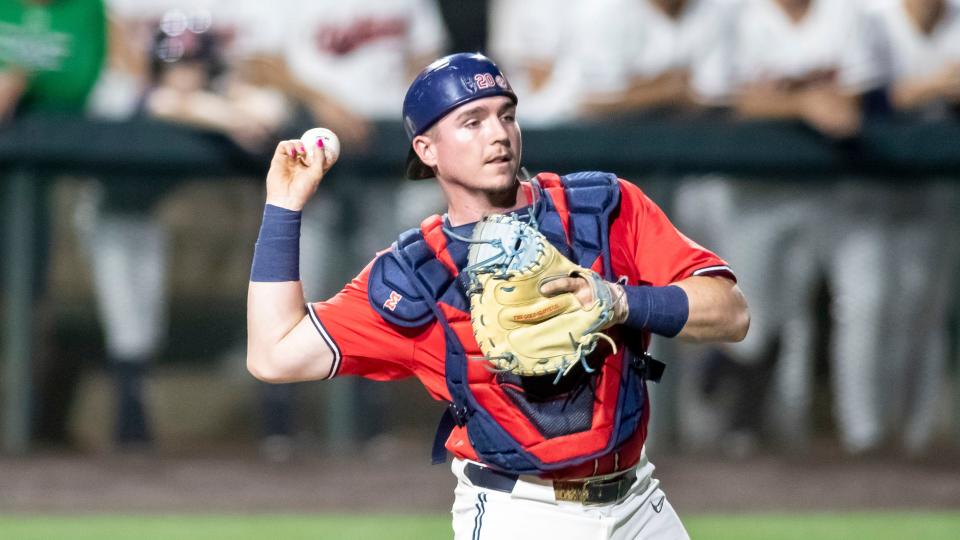 Mississippi catcher Hayden Dunhurst (13) during an NCAA baseball game on Thursday, March 17, 2022, in Auburn, Ala. (AP Photo/Vasha Hunt)