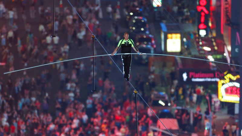 FILE PHOTO: Aerialist Wallenda walks the highwire with his sister over Times Square in New York