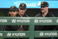 Pittsburgh Pirates pitchers Jared Jones, Mitch Keller and Paul Skenes, from left, stand in the dugout during the seventh inning of the team's baseball game against the Chicago Cubs in Pittsburgh, Saturday, May 11, 2024. (AP Photo/Gene J. Puskar)