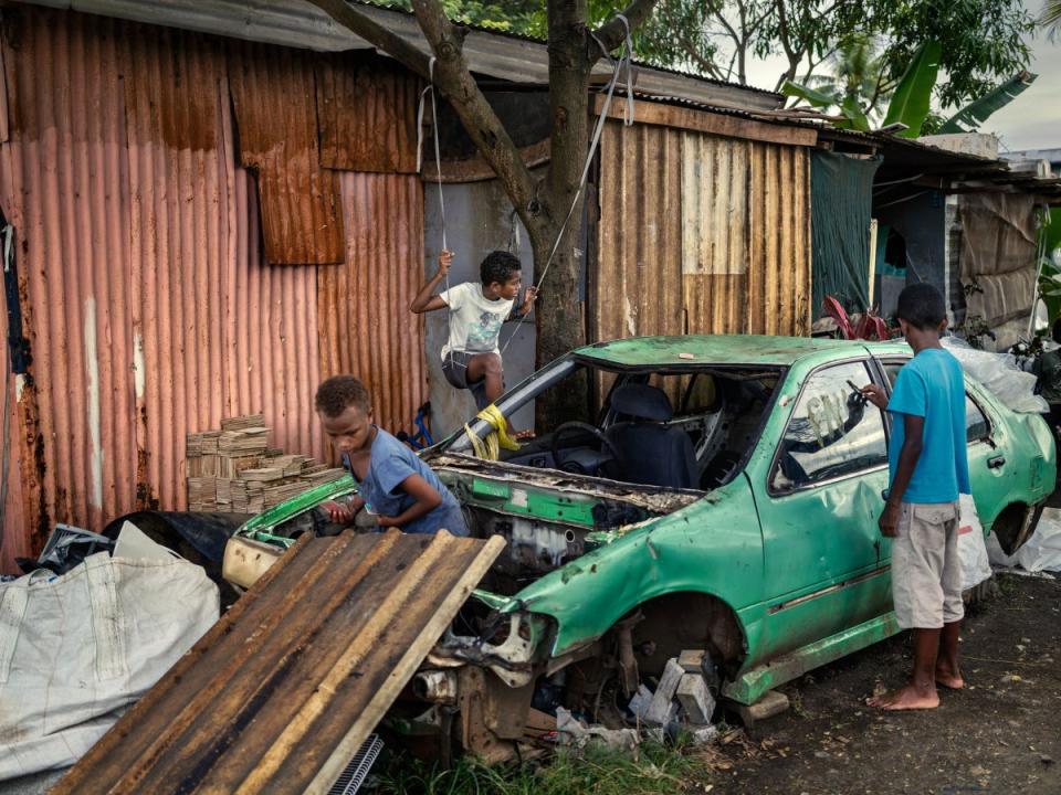 Children play outside of Lewabeka's home on Viti Levu island.