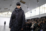 A model wears a creation as part of the Junya Watanabe menswear Fall-Winter 2023-24 collection presented in Paris, Friday, Jan. 20, 2023. (AP Photo/Lewis Joly)