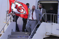 Kansas City Chiefs head coach Andy Reid arrives with his team for the NFL Super Bowl 55 football game against the Tampa Bay Buccaneers, Saturday, Feb. 6, 2021, in Tampa, Fla. (AP Photo/Charlie Riedel)