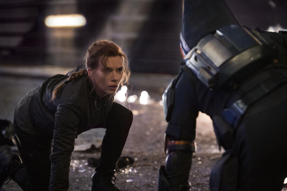 This image released by Disney shows Scarlett Johansson in a scene from "Black Widow." (Jay Maidment/Disney-Marvel via AP)