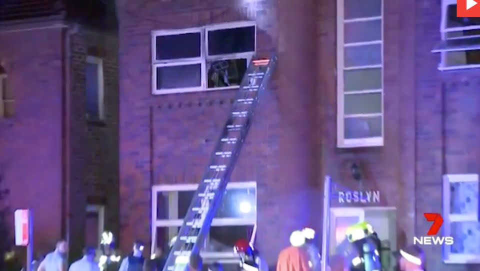 The family were forced to jump from the window of their burning unit in Ashfield. Source: 7 News