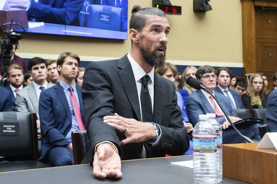 Michael Phelps, former Olympic athlete, testifies during a House Committee on Energy and Commerce Subcommittee on Oversight and Investigations hearing examining Anti-Doping Measures in Advance of the 2024 Olympics, on Capitol Hill, Tuesday, June 25, 2024, in Washington. (AP Photo/Rod Lamkey, Jr.)