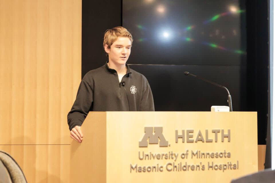 Casey O’Brien talks to patients at the University of Minnesota Masonic Children’s hospital. (Photo credit: Casey O’Brien family)