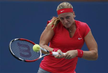 Petra Kvitova of the Czech Republic hits a return to Alison Riske of the U.S. at the U.S. Open tennis championships in New York August 31, 2013. REUTERS/Eduardo Munoz