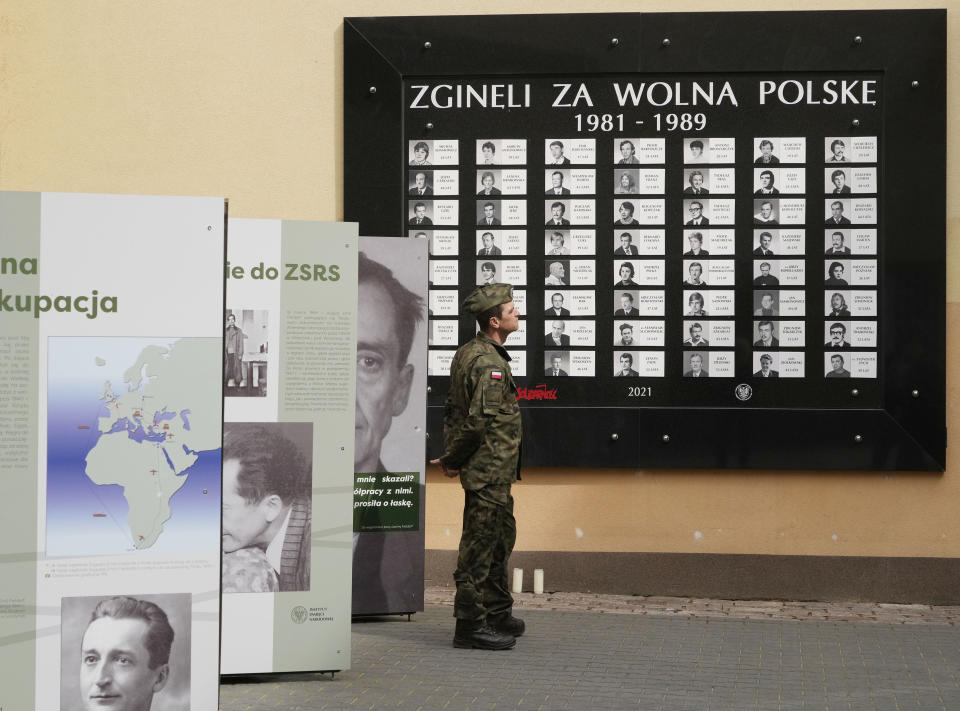 A Polish soldier visits the 'Museum of Cursed Soldiers and Political Prisoners of the Polish People's Republic' in Warsaw, Poland, Tuesday, April 11, 2023. Israel's national Holocaust memorial, Yad Vashem, has criticized a new agreement renewing Israeli school trips to Poland, saying it recommends a number of "problematic sites" that distort history. (AP Photo/Czarek Sokolowski)