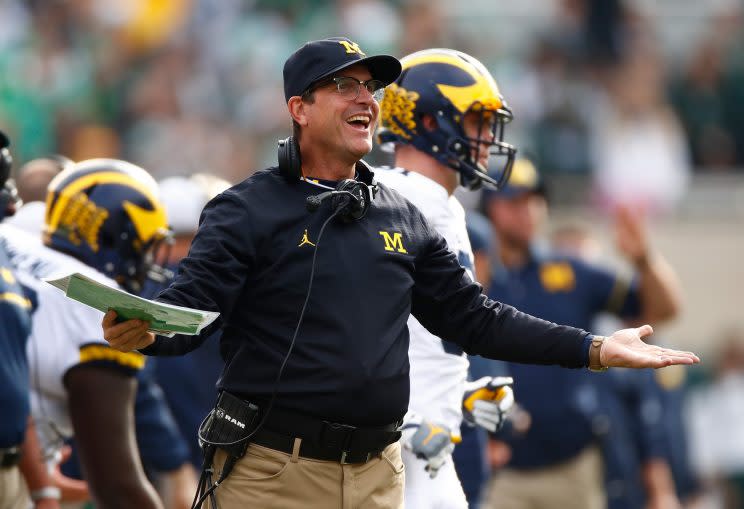 Jim Harbaugh is adding a high school coach — and father of an elite prospect — to Michigan’s staff. (Getty)