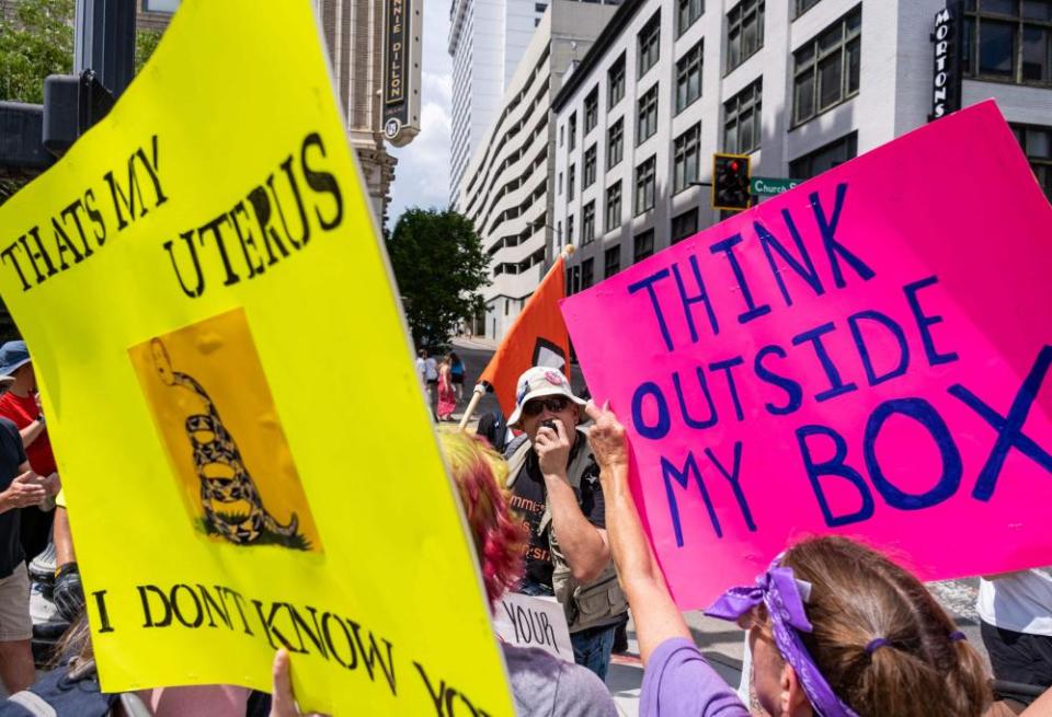 Pro-choice protesters block an anti-abortion activist at a demonstration in Nashville, Tennessee, on 14 May 2022.
