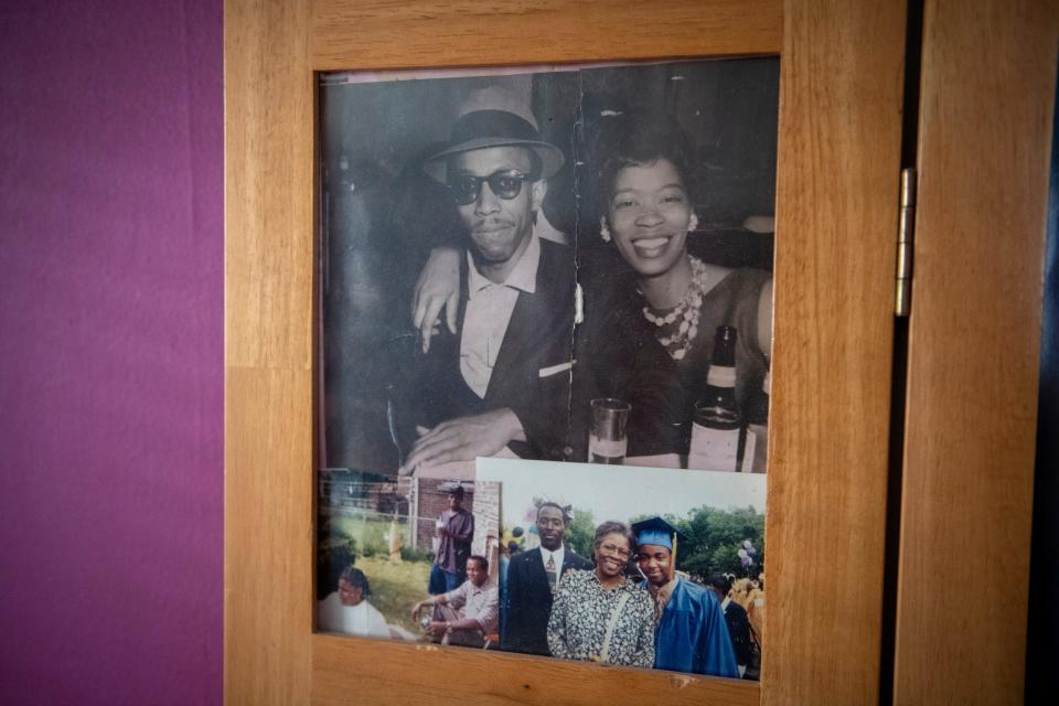 Photos of Charles and Osie Frazier are prominently displayed sit on display in a screen in the Frazier family home in Chicago.