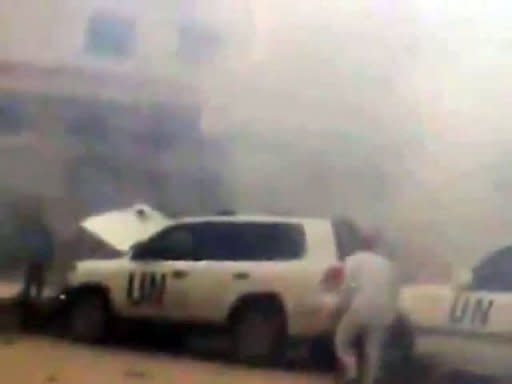 An image grab from video footage uploaded on Youtube allegedly shows a UN observers convoy seconds after a roadside bomb exploded in front of it in Khan Sheikhun between the cities of Hama and Idlib, without causing any injuries, according to UN officials