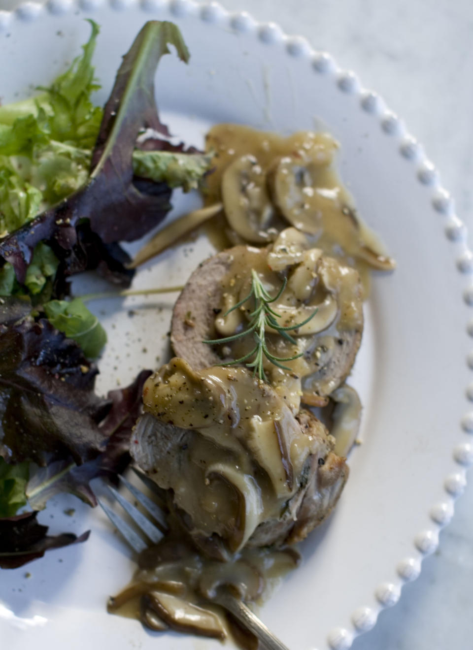 This Nov. 18, 2013 photo shows double pork roast with mushroom marsala sauce in Concord, N.H. (AP Photo/Matthew Mead)