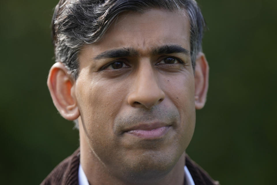 FILE - Britain's Prime Minister Rishi Sunak looks on, during a visit to Writtle University College, in Writtle, near Chelmsford, England, Thursday, Sept. 21, 2023. (AP Photo/Alastair Grant, File)