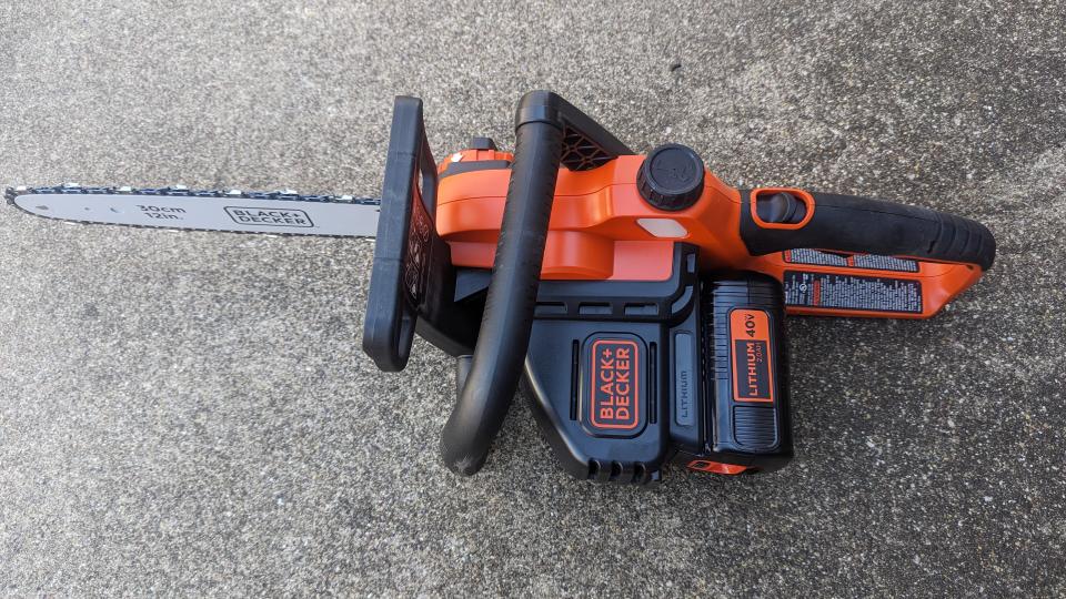 Top view of the BLACK + DECKER 40V MAX 12-inch Cordless Chainsaw, so all handles and chain brake are visible