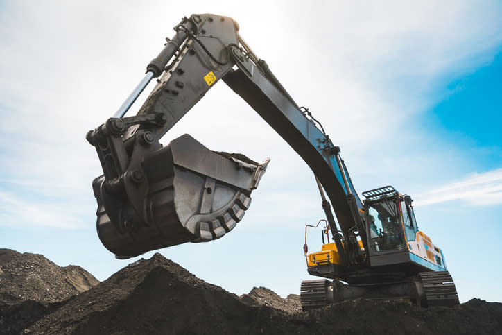 An excavator mining coal.