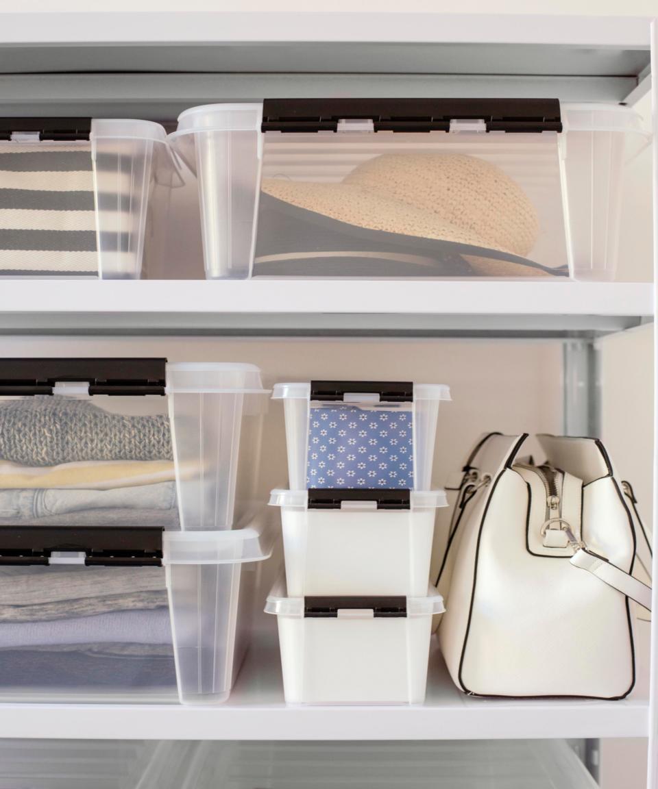 Shelves with storage boxes for clothes and hats