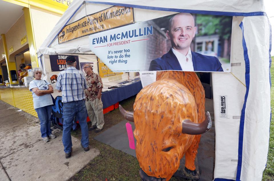 Fairgoers visit an Independence Party tent at the Minnesota State Fair last August. (Photo: Jim Mone/AP)