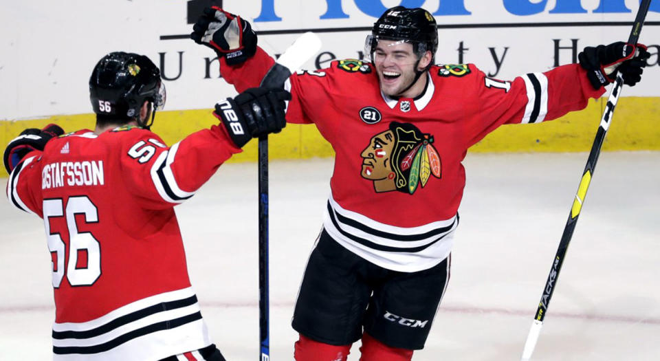Alex DeBrincat has forged a bond with Jonathan Toews that has helped him excel. (AP)