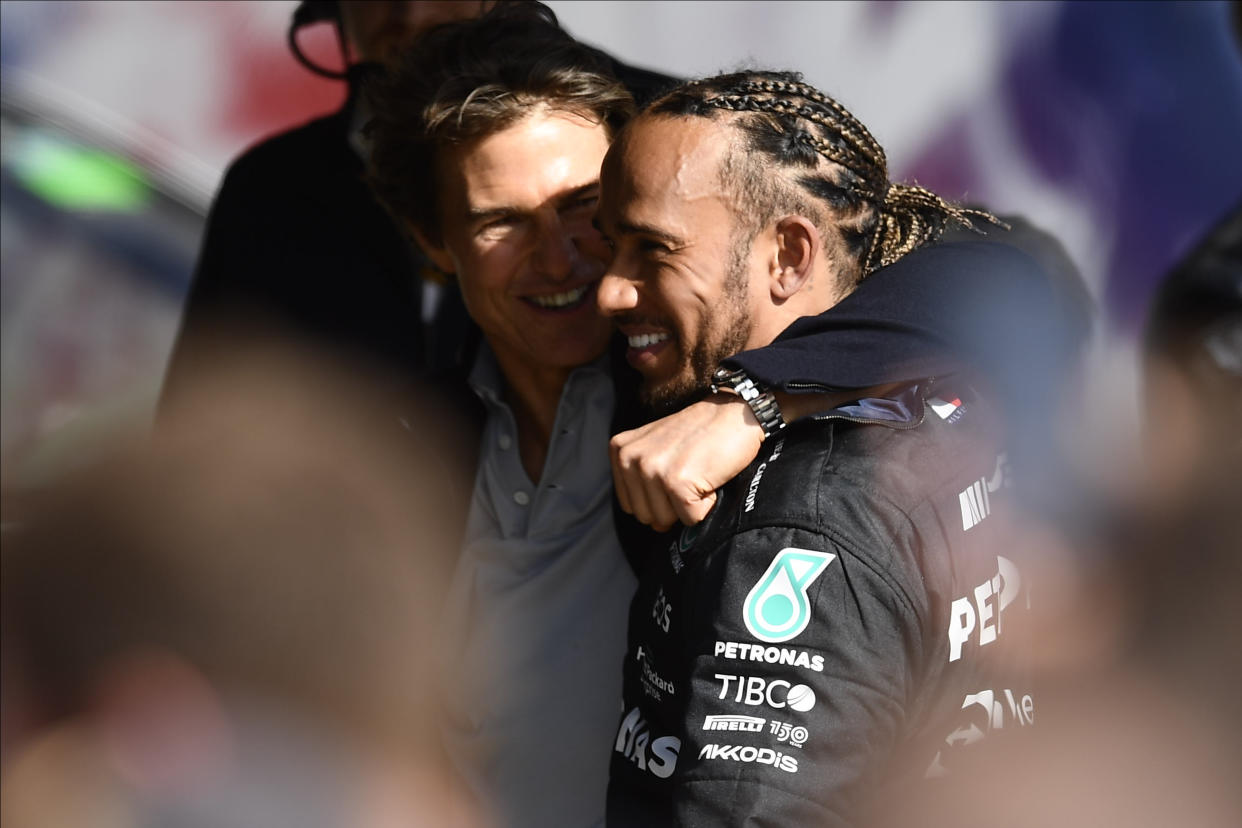 Lewis Hamilton of Great Britain and Mercedes AMG Petronas F1 Team with the actor Tom Cruise during the race of the F1 Grand Prix of Great Britain at Silverstone on July 3, 2022 in Northampton, United Kingdom. (Photo by Jose Breton/Pics Action/NurPhoto via Getty Images)