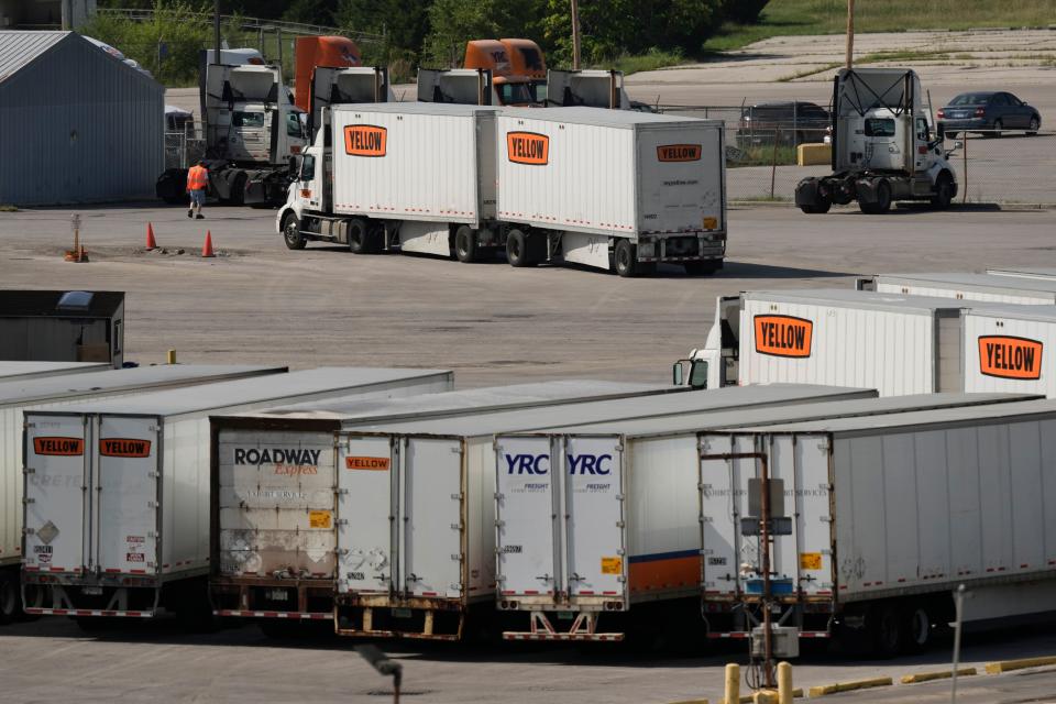 Yellow Corp. trucks are seen at a YRC Freight terminal Friday, July 28, 2023, in Kansas City, Mo. After years of financial struggles, Yellow is reportedly preparing for bankruptcy and seeing customers leave in large numbers — heightening risk for future liquidation. While no official decision has been announced by the company, the prospect of bankruptcy has renewed attention around Yellow's ongoing negotiations with unionized workers, a $700 million pandemic-era loan from the government and other bills the trucker has racked up over time. (AP Photo/Charlie Riedel)