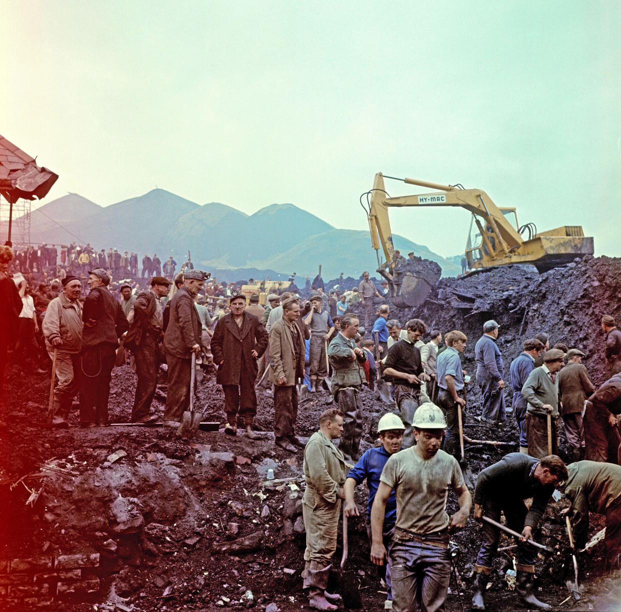 The Disaster scene at Aberfan, South Wales At 9.15 am on Friday 21 October 1966, after days of rain, a mining waste tip slid down a mountainside into the village of Aberfan, near Merthyr Tydfil in South Wales. It first destroyed a farm cottage in its path, killing all the occupants, before engulfing 20 houses and Pantglas Junior School where pupils had just returned to class after singing 'All Things Bright and Beautiful' at assembly. The toll was 144 dead, 116 of them children A small section of the school roof can be seen on the left of the picture Picture taken by Carl Bruin Picture taken circa 21st October 1966. (Photo by Carl Bruin/Mirrorpix/Getty Images)