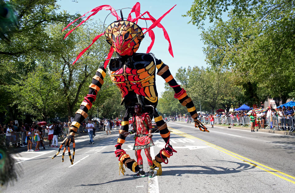 <p>Costumed dancers move about during the annual West Indian Day Parade on September 03, 2018 in Brooklyn. (Photo by Yana Paskova/Getty Images) </p>