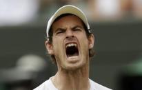 Andy Murray of Britain reacts during his match against Robin Haase of the Netherlands at the Wimbledon Tennis Championships in London, July 2, 2015. REUTERS/Henry Browne