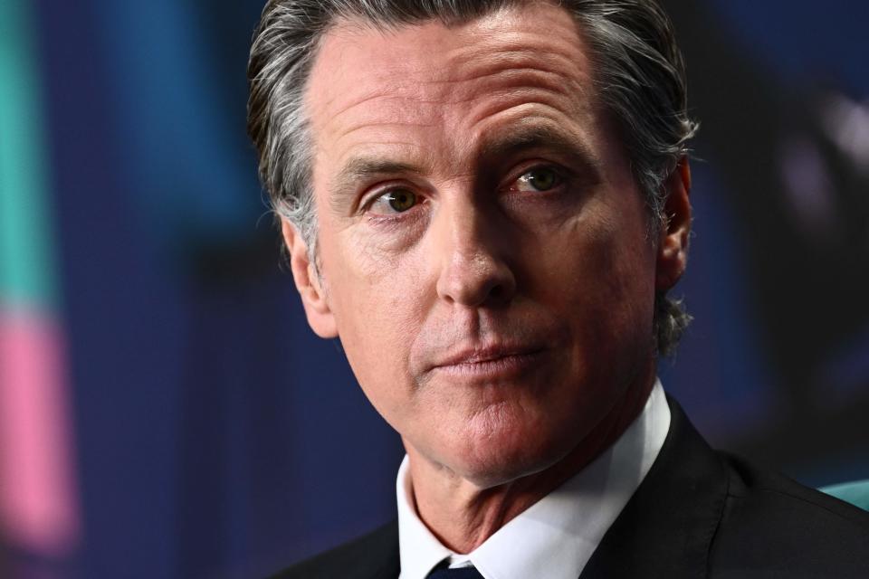 California Governor Gavin Newsom speaks during the Milken Institute Global Conference in Beverly Hills, California on May 2, 2023. Newsom said California authorities are investigating whether any laws were broken when a group of more than a dozen migrants were flown to the state recently.