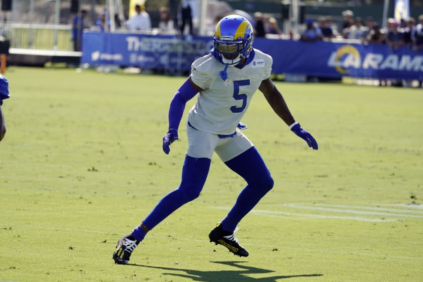 Los Angeles Rams defensive back Jalen Ramsey covers during an NFL football camp practice Wednesday, July 28, 2021, in Irvine, Calif. (AP Photo/Marcio Jose Sanchez)