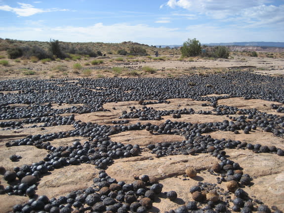 Moqui marbles on a sandstone slope.