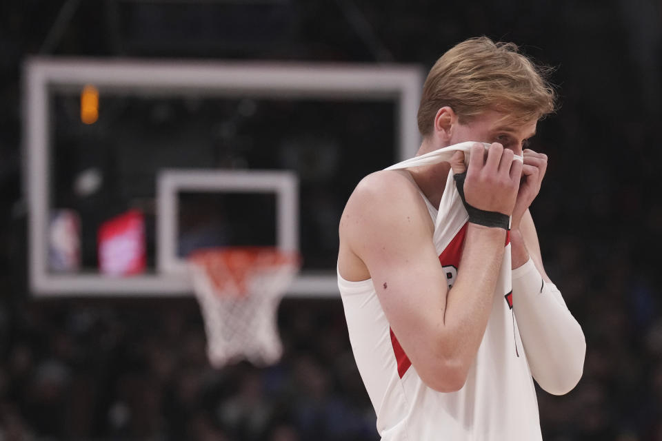 Toronto Raptors' Gradey Dick reacts during his team's loss to the San Antonio Spurs in an NBA basketball game in Toronto, Monday Feb. 12, 2024. (Chris Young/The Canadian Press via AP)